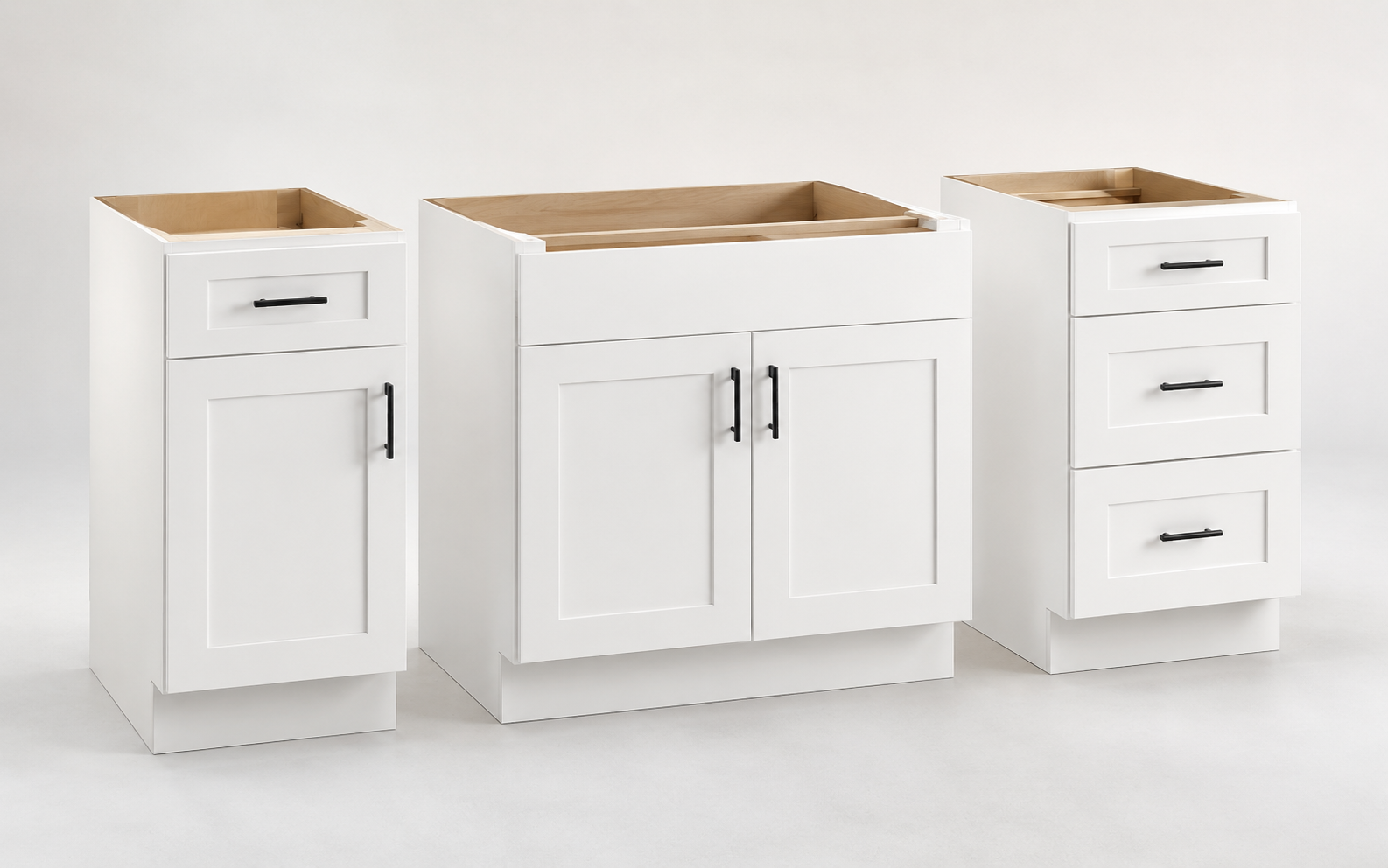 White shaker base cabinets including sink base, drawer base, and standard base cabinet options